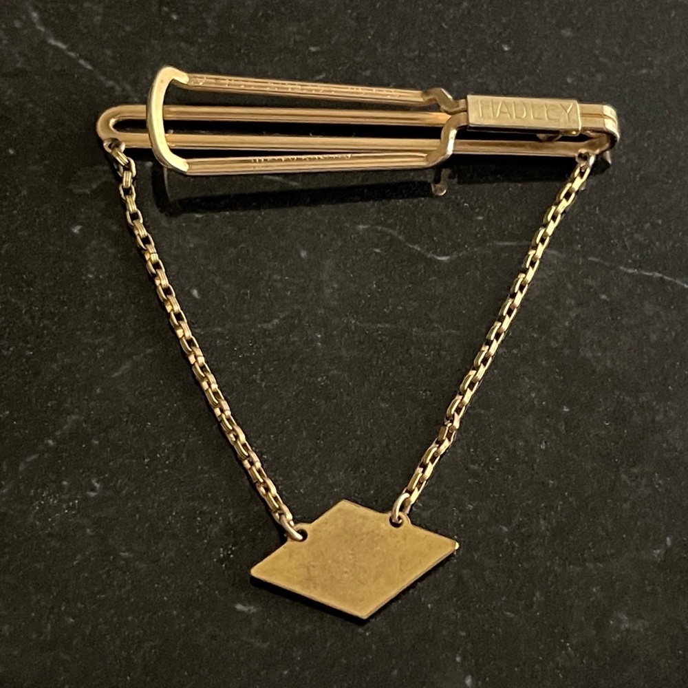 Vintage gold tone Hadley tie.